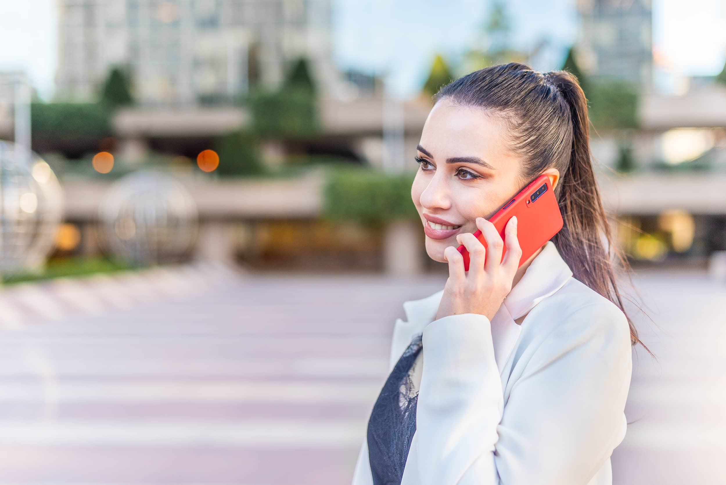 Woman talking on a Samsung Galaxy phone.