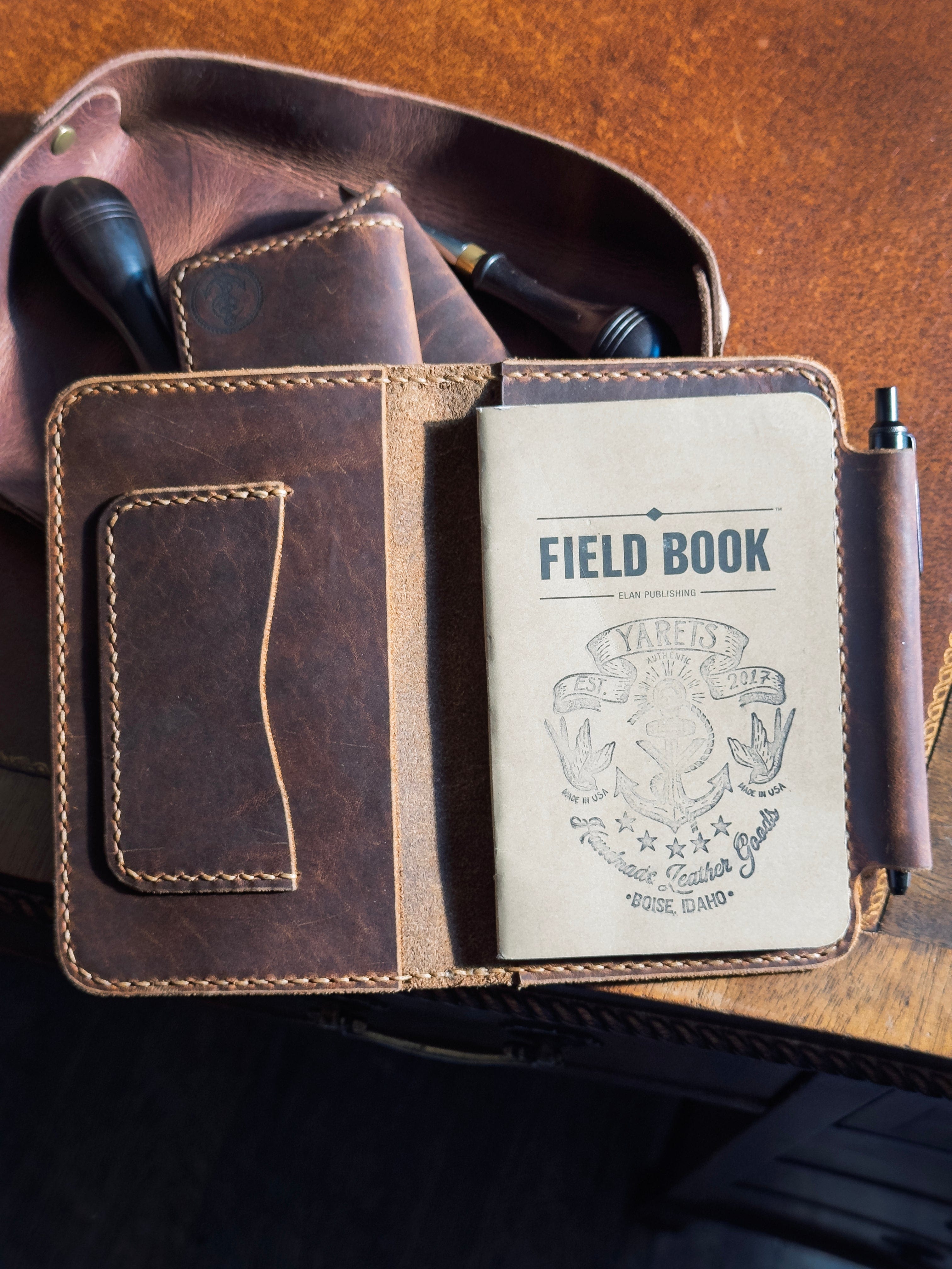 SaharaCase lifestyle photo showcasing rugged protective tablet case with strap and stand.
